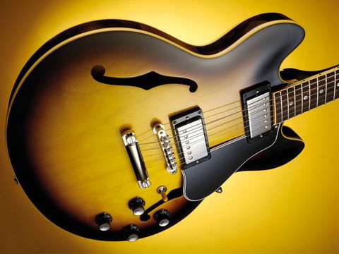 The ES-339 top is laminate maple and poplar which is pressed and lightly arched
