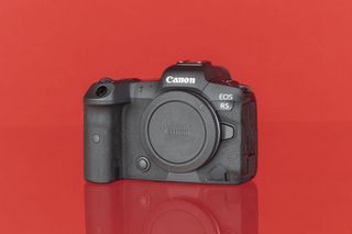 Canon EOS R5 on a red background
