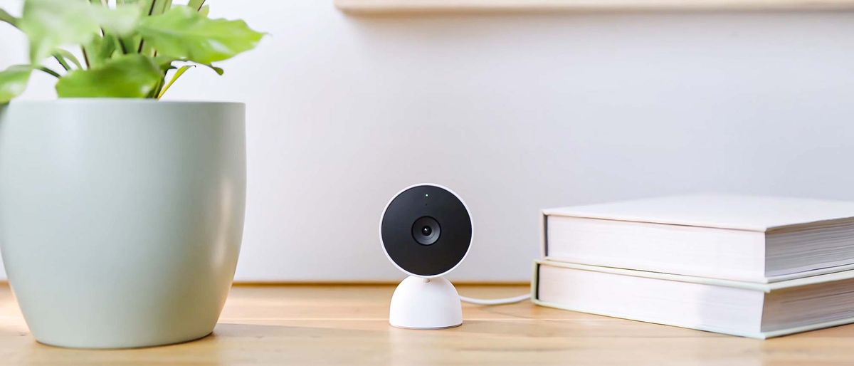 Nest Cam (indoor, wired) on bookshelf