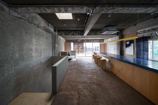 interior of fishmarket, the brutalist artist's studio in kanazawa by ab rogers