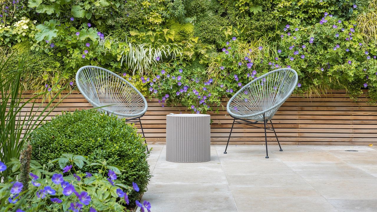 contemporary patio area using limestone patio materials designed by John Davies