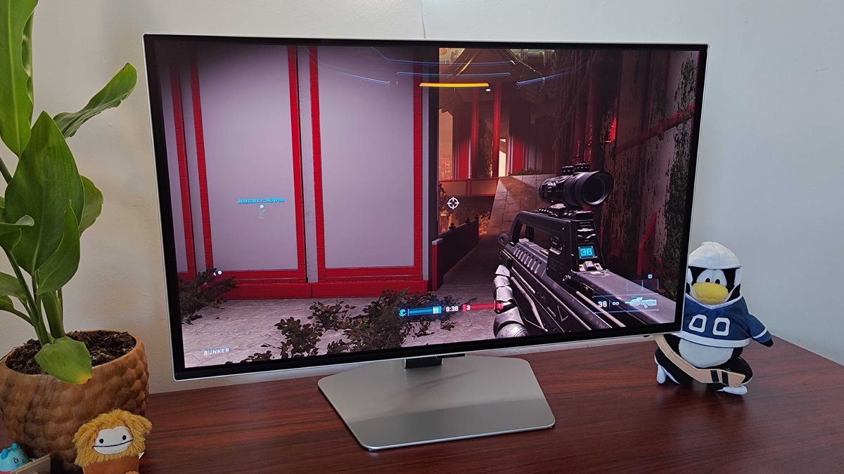 Samsung Odyssey OLED G6 with Halo Infinite multiplayer gameplay on screen