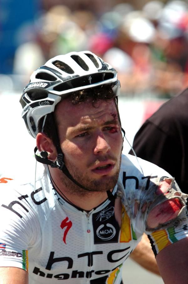 A sore looking Cavendish crosses the line