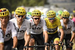 From L Belarus Vasil Kiryienka Polands Michal Kwiatkowski Great Britains Luke Rowe Great Britains Christopher Froome wearing the overall leaders yellow jersey and Spains Mikel Landa ride during the 2225 km nineteenth stage of the 104th edition of the Tour de France cycling race on July 21 2017 between Embrun and SalondeProvence AFP PHOTO Lionel BONAVENTURE Photo credit should read LIONEL BONAVENTUREAFP via Getty Images
