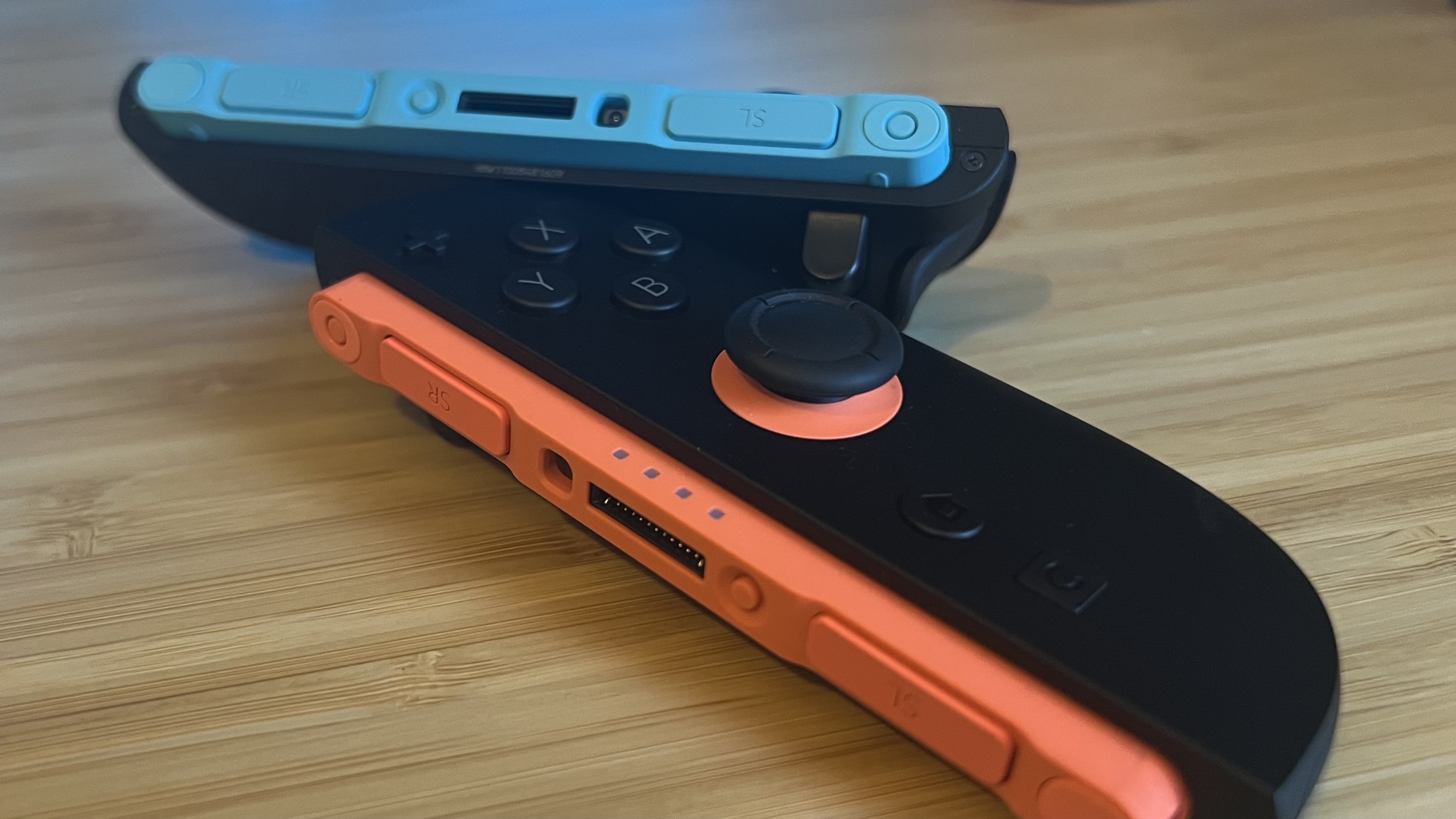 Nintendo Switch 2 Joy-Con on a wooden desk