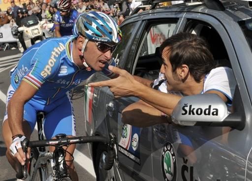 Paolo Bettini and Fraco Ballerini confer during the 2008 World Championship road race in Varese, Italy