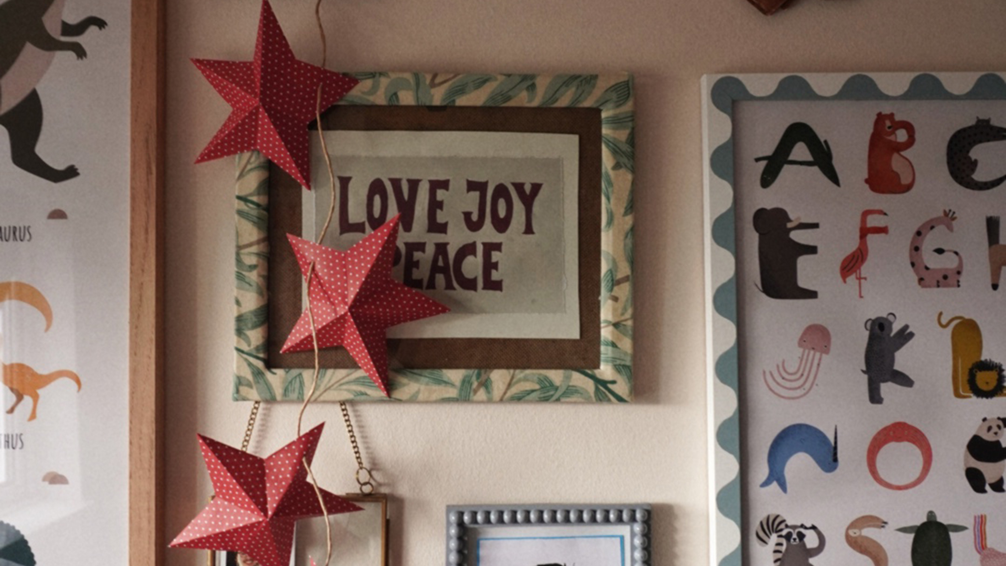 star garland hanging over some wall art