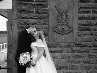 a couple kissing at st andrews