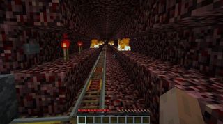 Minecraft - a long minecart track running through the Nether