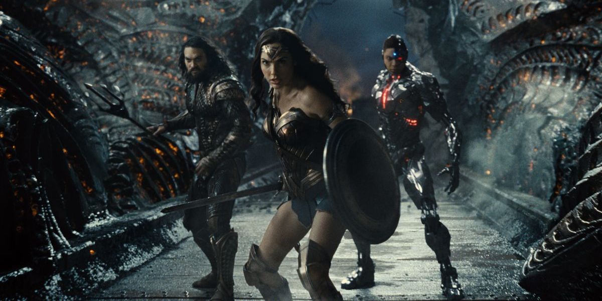 Aquaman, Wonder Woman, and Cyborg lined up inside Steppenwolf&#039;s lair in Zack Snyder&#039;s Justice League .