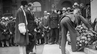 Mourners lay a wreath on the Cenotaph to honor pilot Amelia Earhart.