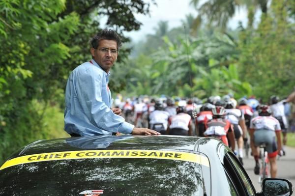 Majid Nasseri (UCI-UAE) Chief Commissaire Tour de Singkarak 2012 on duty wathced the riders in race.