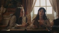 Esme Creed-Miles looking at Daisy Edgar Jones in Sense and Sensibility. 