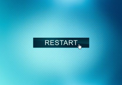 mouse cursor hovers over &quot;restart&quot; button on blue screen