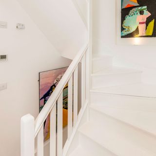 stairs and painting on wall