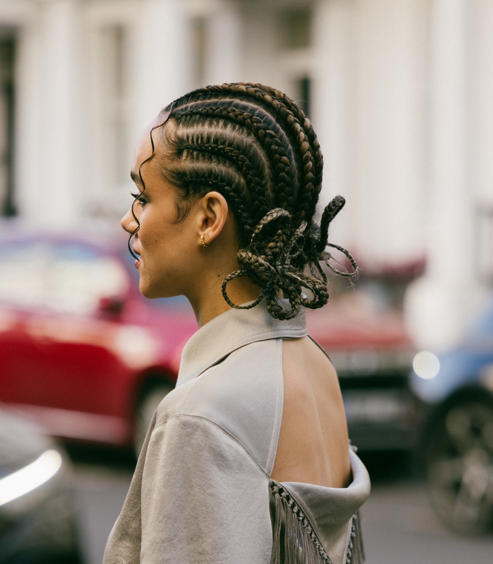 Nathalie Emmanuel with bow braids in profile