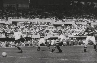 Josef Hügi scores for Switzerland against Austria at the 1954 World Cup.