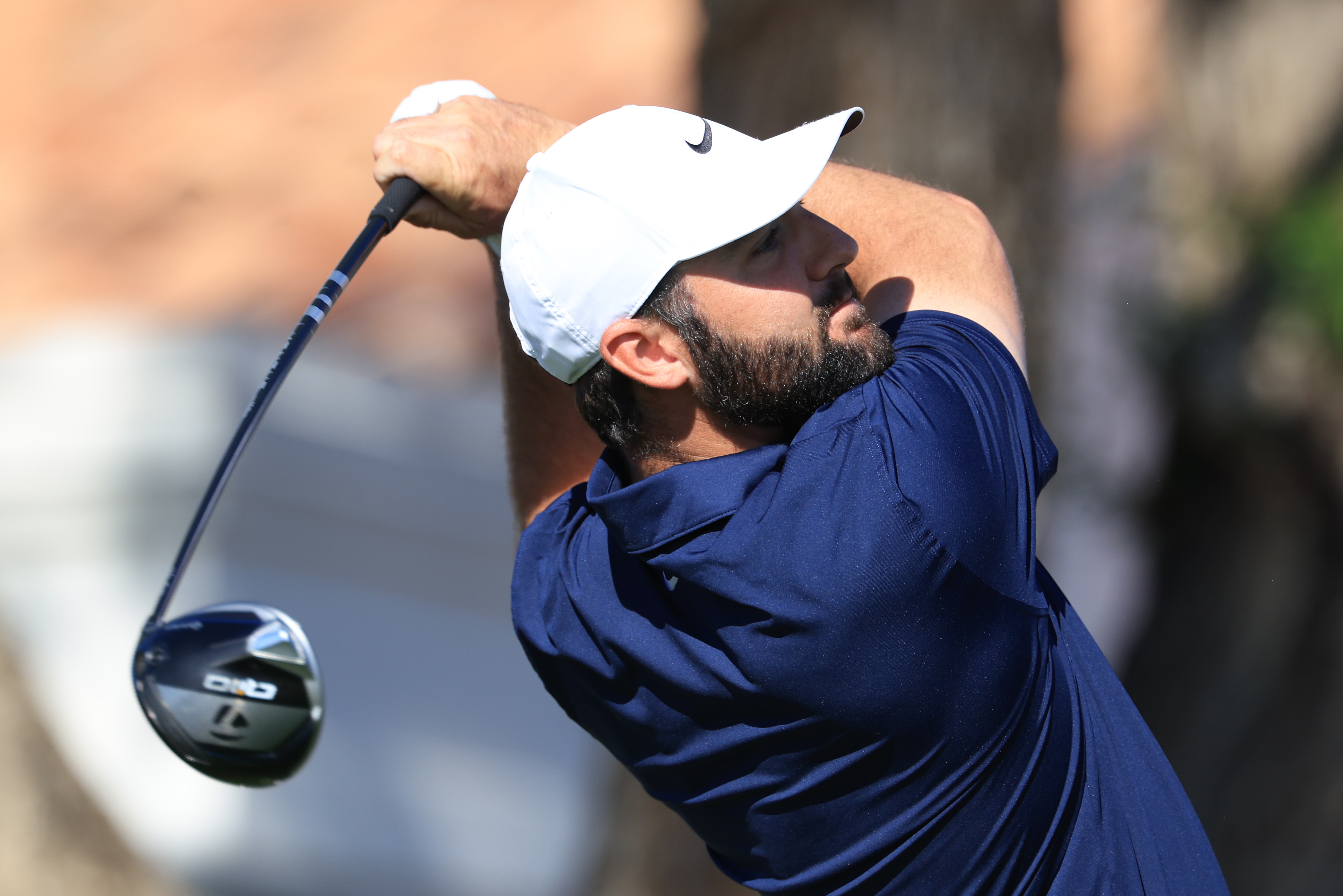 Scottie Scheffler hits a driver off the tee