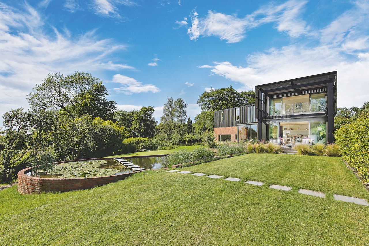 exterior of self build with swimming pool