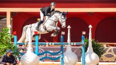 Harry Charles and his exciting new horse Fighting Phil in action at Al Shaqab