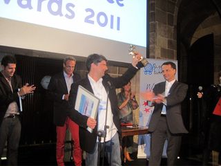Thomann collect the European Online Retailer Of The Year award.