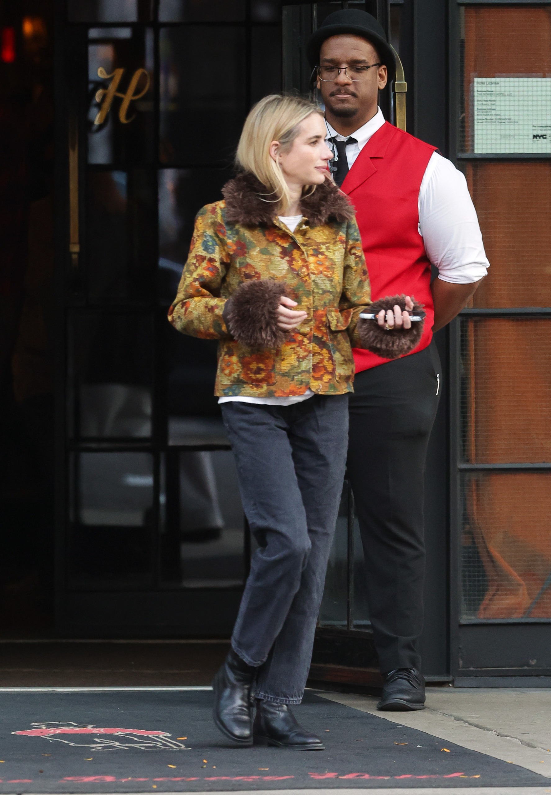Emma Roberts and Cody John step out with her mom and family in New York City. The American actress wore a Mar&amp;agrave;vic jacket, black jeans, and matching boots.