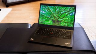 Lenovo ThinkPad X13 (AMD) on a coffee table