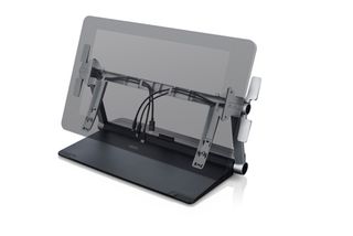The ergo stand no longer comes with the Cintiq, but can still be bought separately