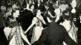 Queen Elizabeth II dancing at a ball