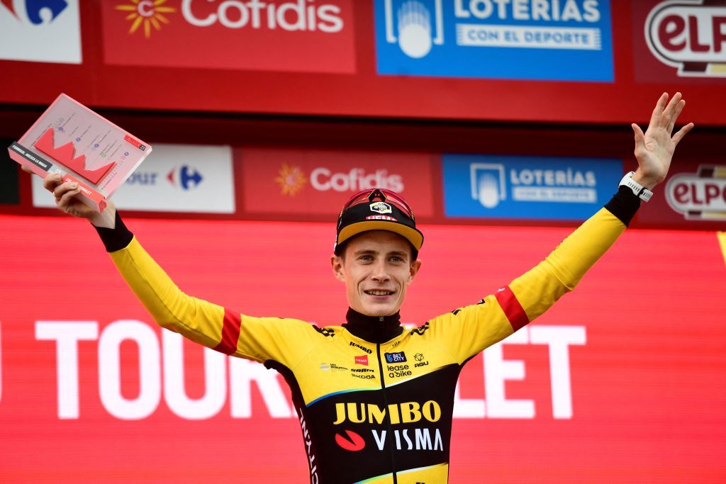 Team JumboVismas Danish rider Jonas Vingegaard celebrates on the podium winning in the stage 13 of the 2023 La Vuelta cycling tour of Spain a 1347 km race between Formigal and the Col du Tourmalet in France on September 8 2023 Photo by ANDER GILLENEA AFP Photo by ANDER GILLENEAAFP via Getty Images