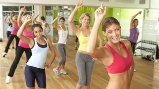 Can you lose weight with dance workouts? image shows women working out to dance