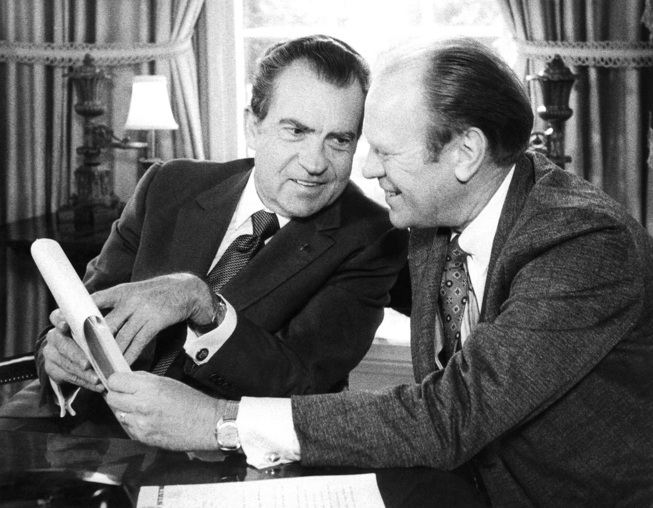 President Richard Nixon meets with then-House Minority Leader Gerald Ford at the White House in 1973.