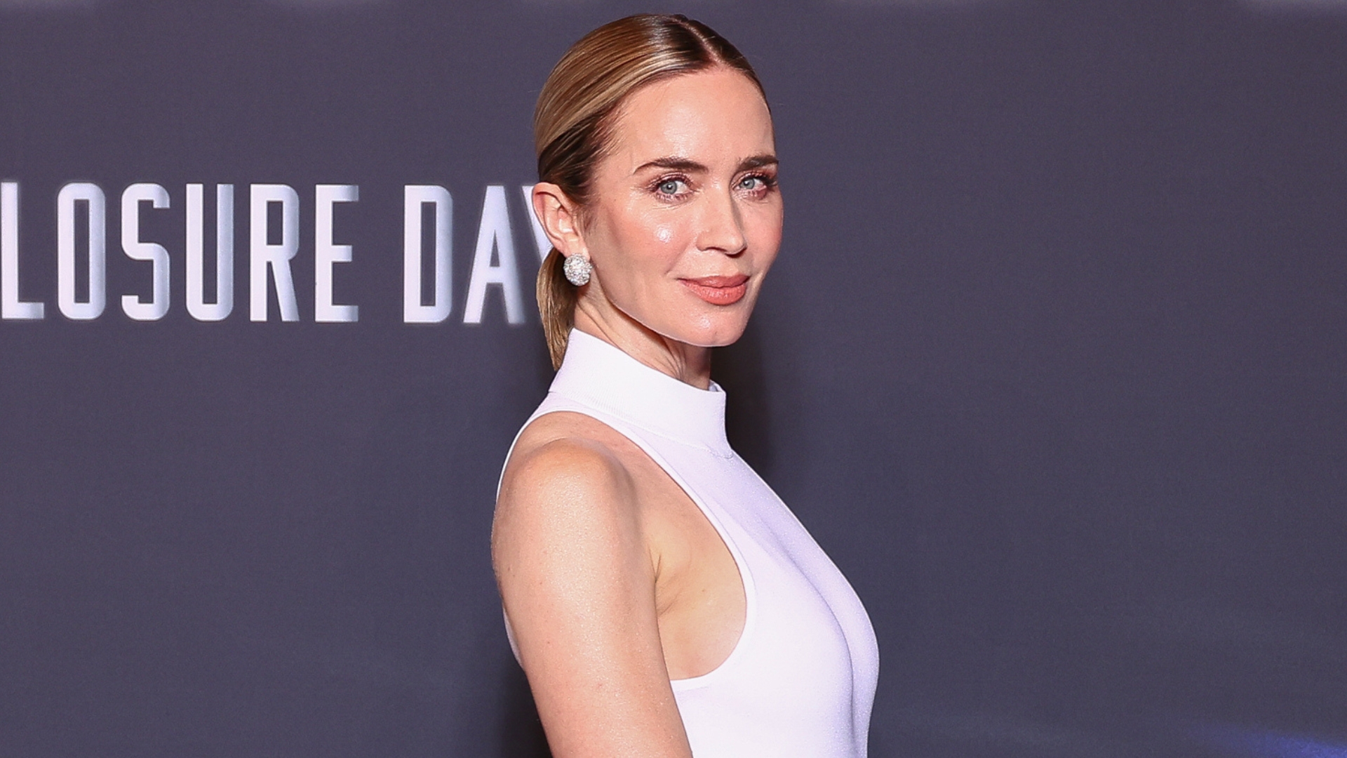 Emily Blunt is pictured with a low ponytail hairstyle at the "Disclosure Day" Paris Premiere at Le Grand Rex on June 02, 2026 in Paris, France.