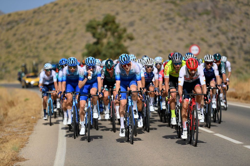 CABO DE GATA SPAIN AUGUST 31 LR Lucas Hamilton of Australia Luke Durbridge of Australia and Team BikeExchange Jayco Lukasz Owsian of Poland and Team Arka Samsic and Julien Bernard of France and Team Trek Segafredo lead the peloton during the 77th Tour of Spain 2022 Stage 11 a 1912km stage from ElPozo Alimentacin Alhama de Murcia to Cabo de Gata LaVuelta22 WorldTour on August 31 2022 in Cabo de Gata Spain Photo by Justin SetterfieldGetty Images