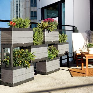 modular planter with white chair wooden table