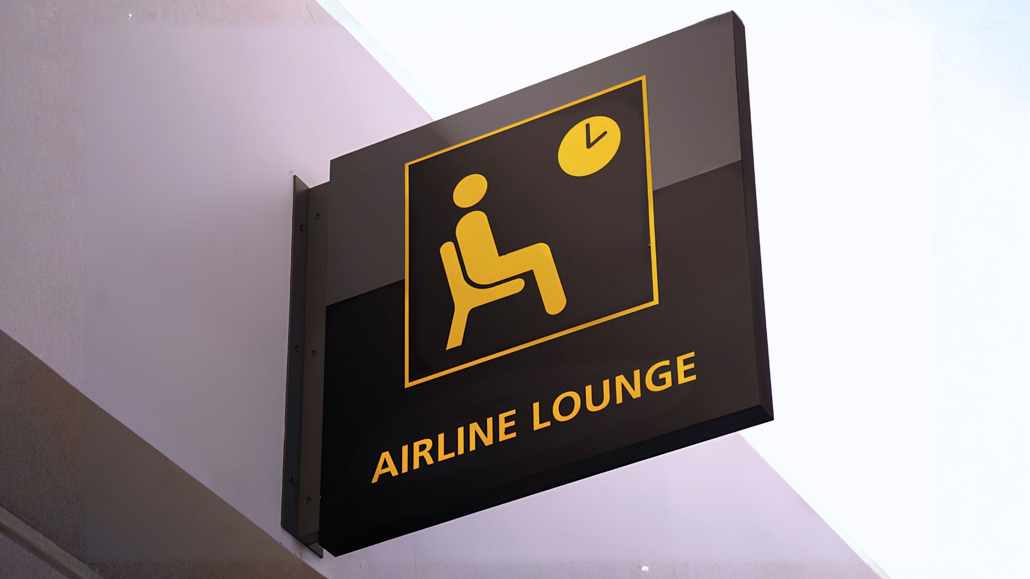  A sign indicates the entrance to an airline lounge in the terminal at John F. Kennedy International Airport. 