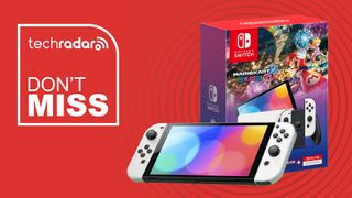 The Nintendo Switch OLED sitting beside a Switch OLED box