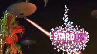 A flying saucer destroying the Stardust hotel in Mars Attacks!