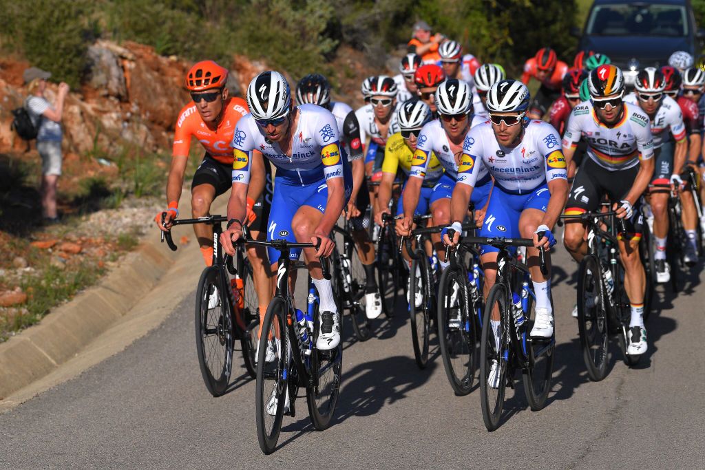 ALTO DO MALHO LOUL PORTUGAL FEBRUARY 22 Tim Declercq of Belgium and Team Deceuninck Quick Step Remco Evenepoel of Belgium and Team Deceuninck Quick Step Yellow Leader Jersey Yves Lampaert of Belgium and Team Deceuninck Quick Step Florian Snchal of France and Team Deceuninck Quick Step Peloton during the 46th Volta ao Algarve 2020 Stage 4 a 1697km stage from Albufeira to Alto do Malho 518m Loul VAlgarve2020 on February 22 2020 in Alto do Malho Loul Portugal Photo by Tim de WaeleGetty Images