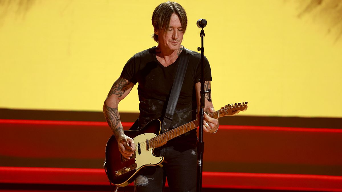 In this image released on September 18, 2024, Keith Urban performs onstage during the 17th Academy Of Country Music Honors at Ryman Auditorium on August 21, 2024 in Nashville, Tennessee