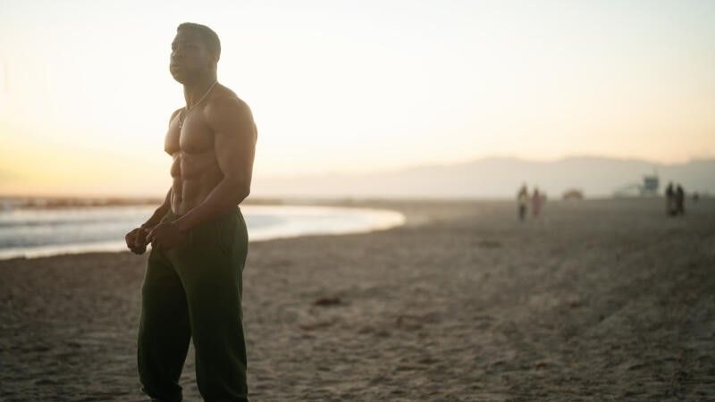 Jonathan Majors on the beach in Creed III