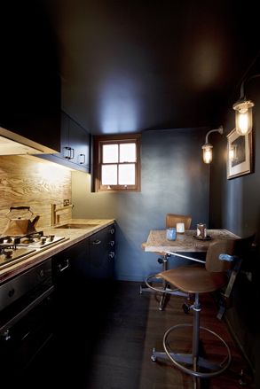 Front living room with kitchenette and a breakfast bar for two