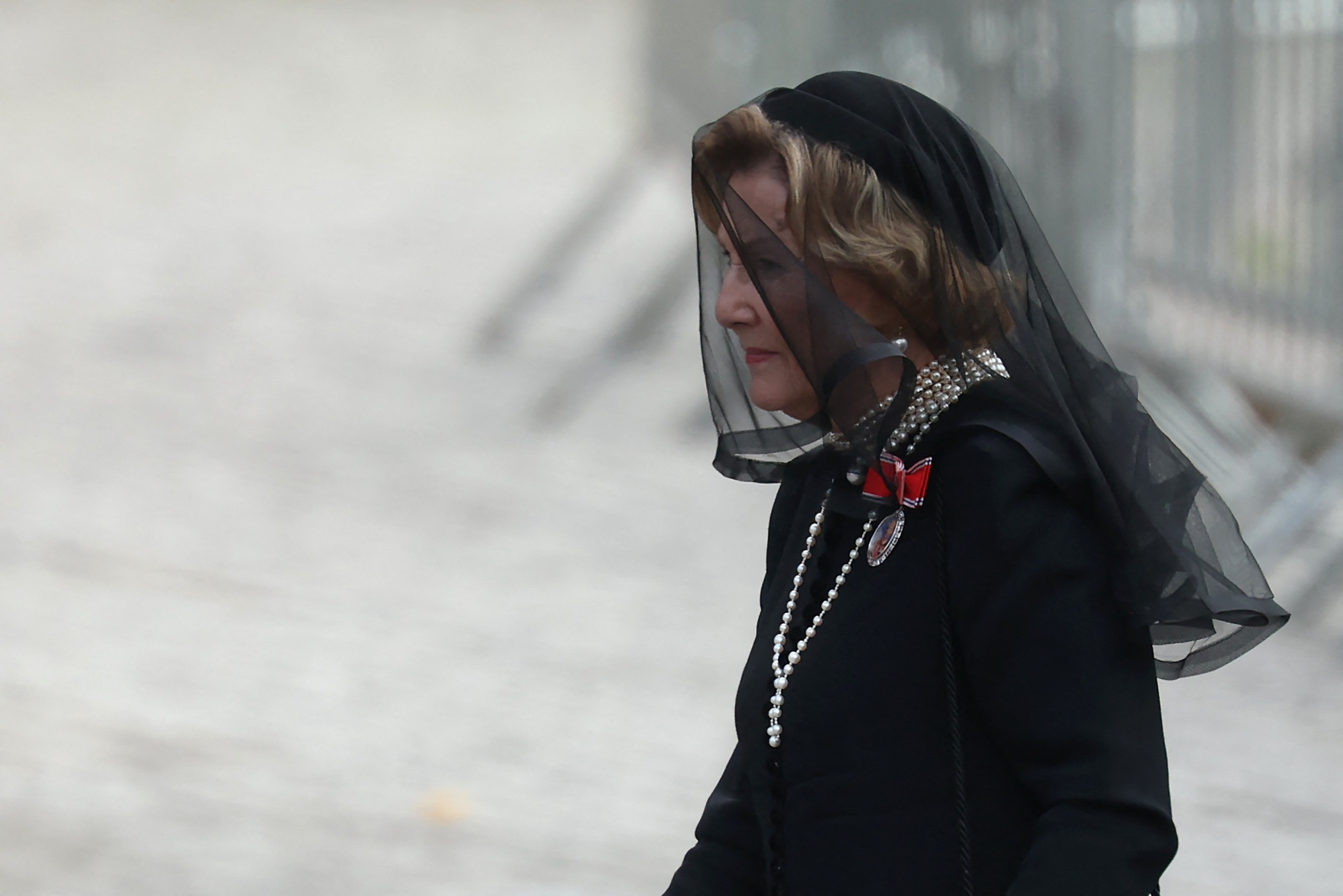 Queen Sonja wearing a mourning veil and pearls