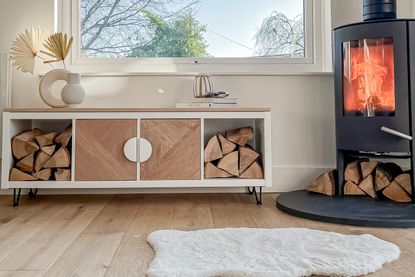 Ikea Kallax hacks sideboard with logs and wood burning fire