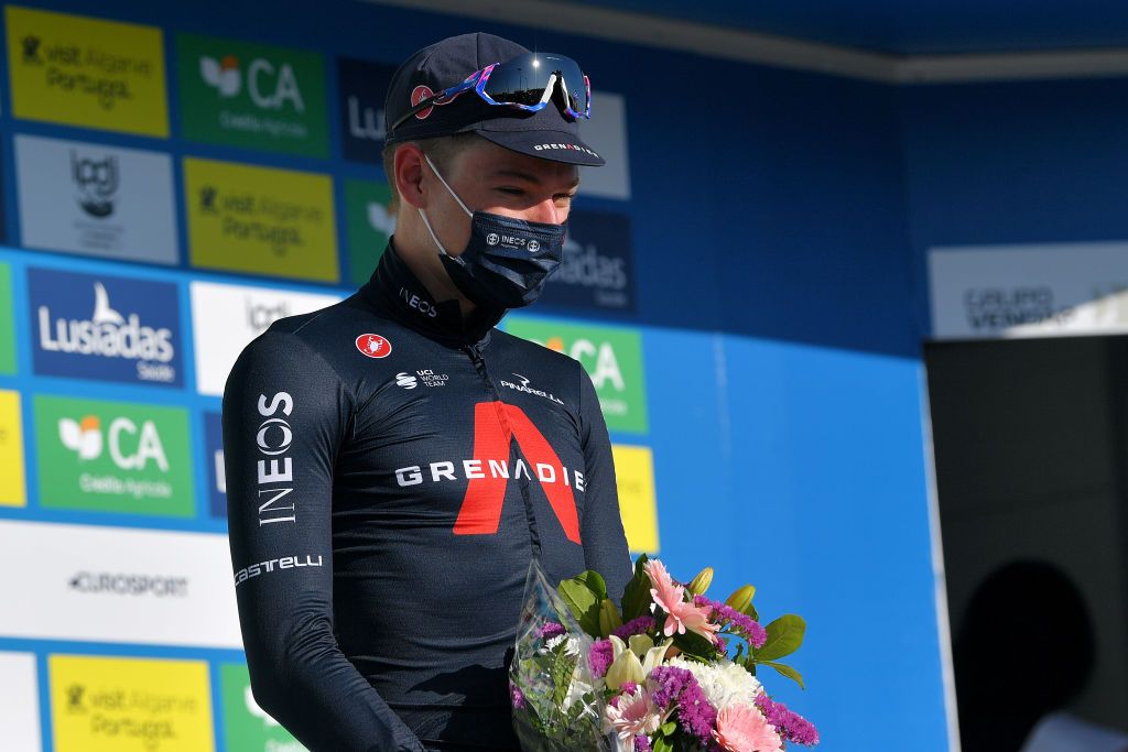 FOIA PORTUGAL MAY 06 Ethan Hayter of United Kingdom and Team INEOS Grenadiers stage winner celebrates at podium during the 47th Volta Ao Algarve 2021 Stage 2 a 1828km stage from Sagres to Fia 890m Mask Covid safety measures VoltAlgarve VAlgarve2021 on May 06 2021 in Fia Portugal Photo by Luc ClaessenGetty Images