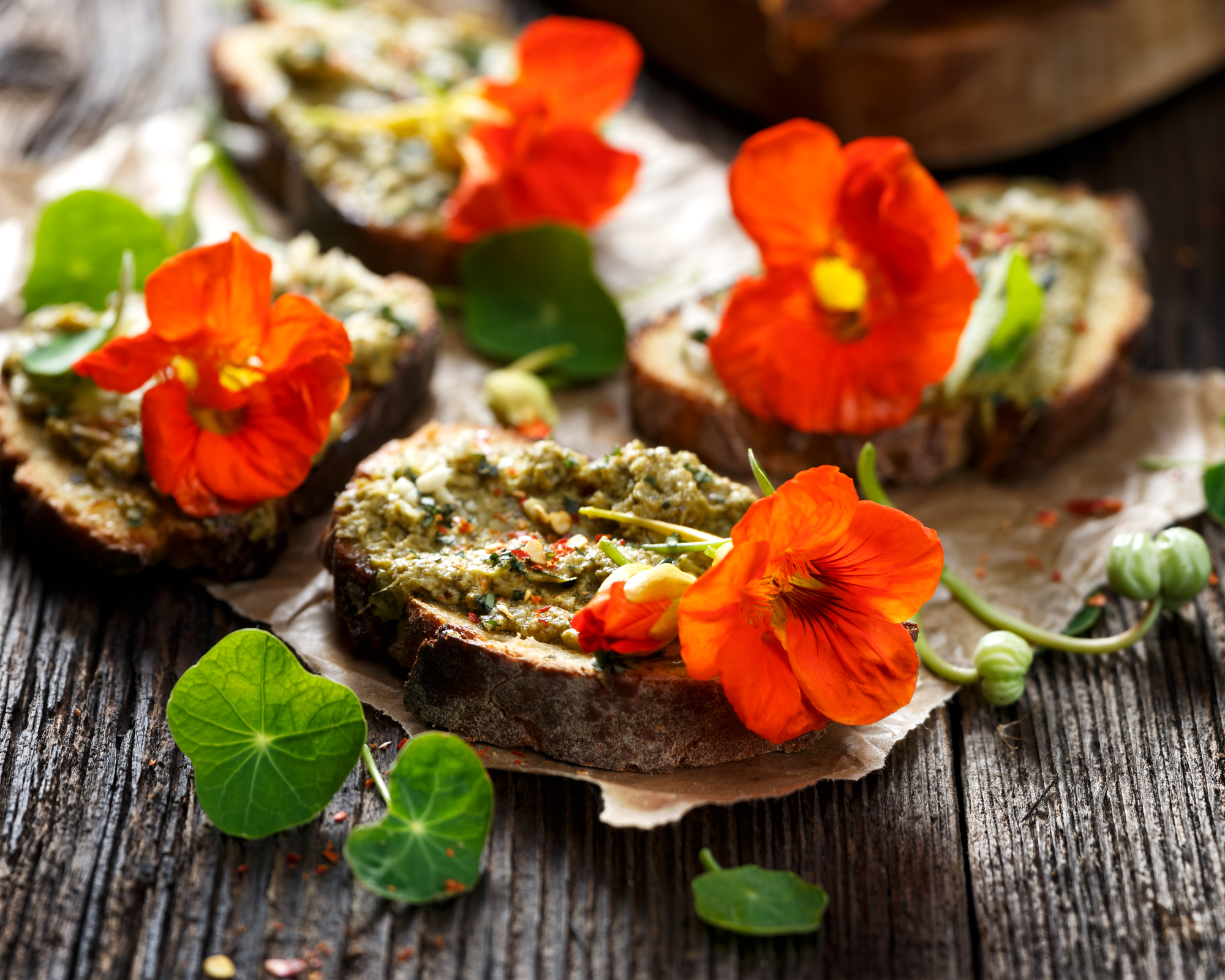 nasturtium flowers and pesto on toast