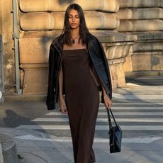 woman wearing brown dress