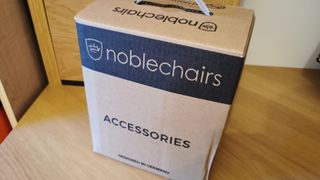 Epic Series real leather chair from Noblechairs accessories box