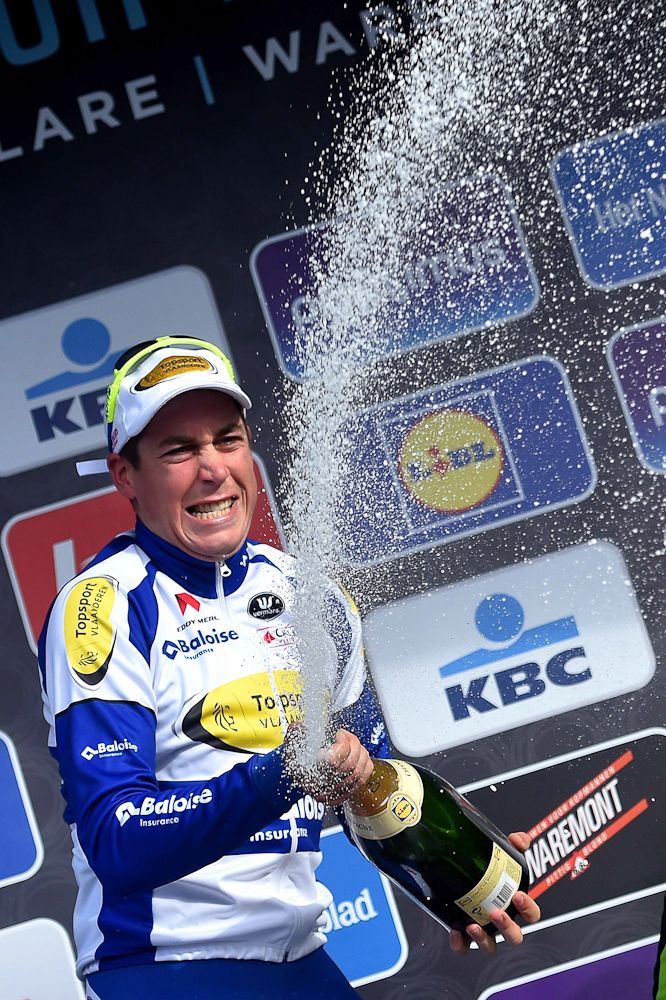 Wallays celebrates on the podium.