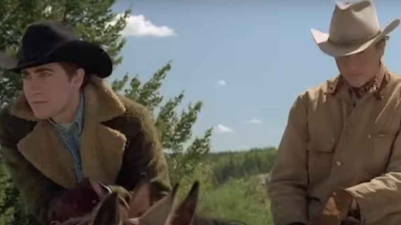 Jake Gyllenhaal and Heath Ledger riding horses in Brokeback Mountain